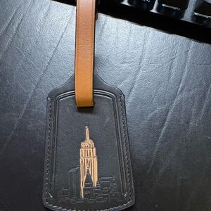 Coach Black and Tan Luggage Tag with NYC Design